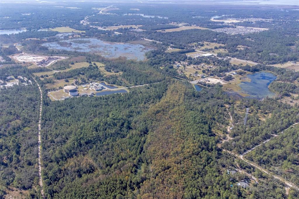 736 Keelhaul Road Osteen, FL 32764 - Photo 9 of 31 an aerial view of house with yard and mountain view in back