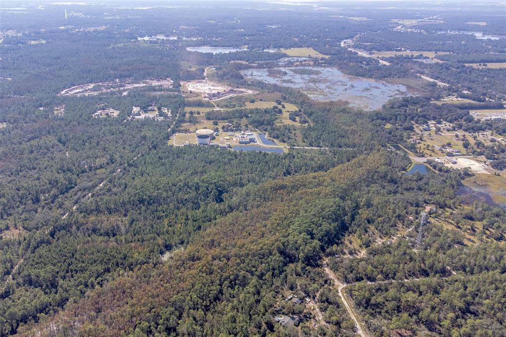736 Keelhaul Road Osteen, FL 32764 - Photo 10 of 31 an aerial view of residential house and green space