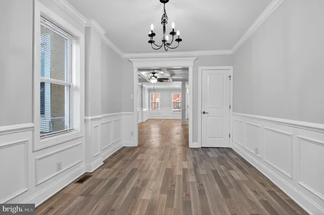 a kitchen with a stove and a refrigerator