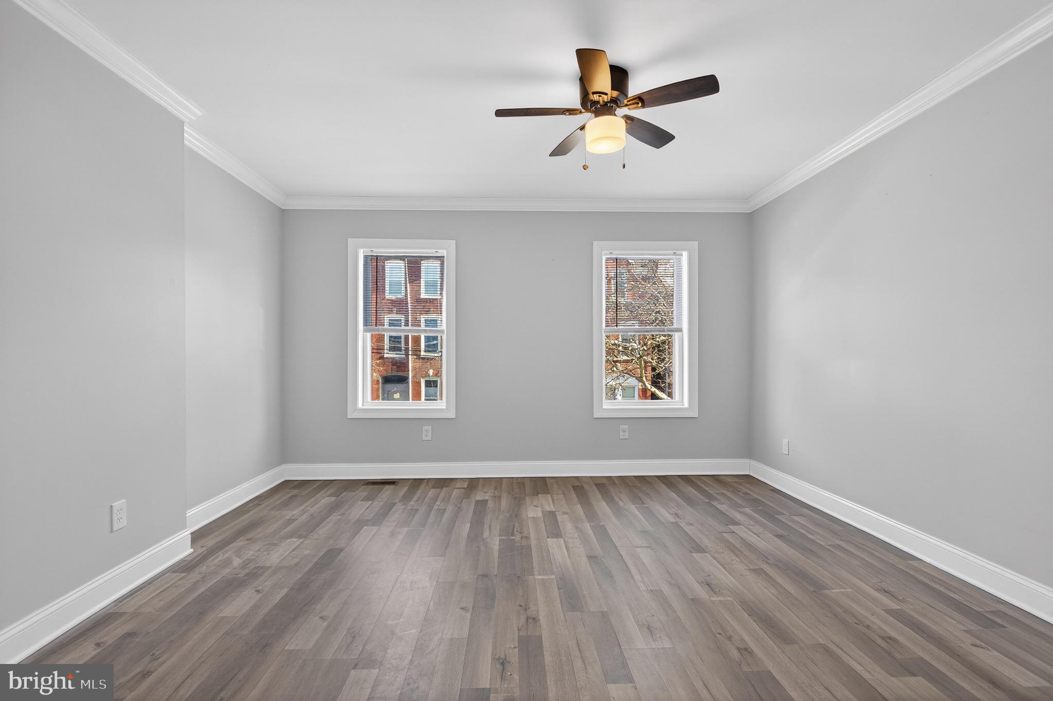 39 Carroll Street Trenton, NJ 08608 - Photo 20 of 27 wooden floor in an empty room with a window