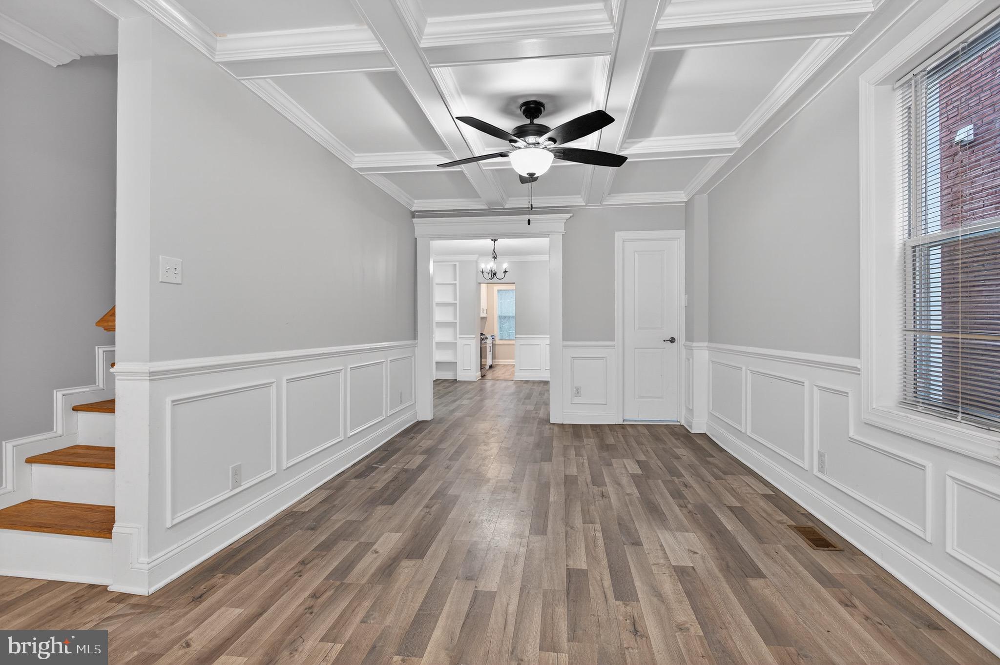 39 Carroll Street Trenton, NJ 08608 - Photo 9 of 27 a view of empty room with wooden floor and fan