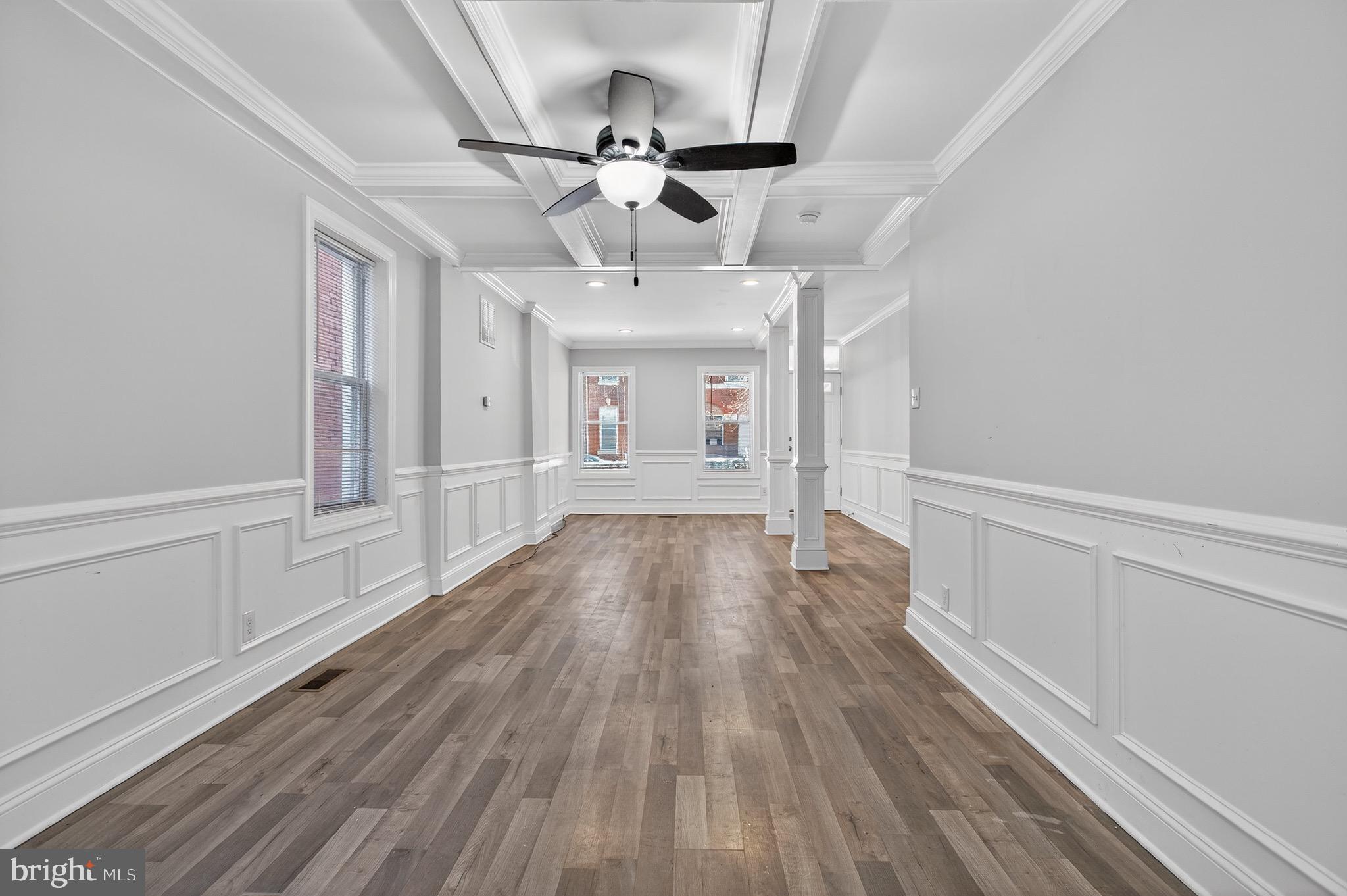 39 Carroll Street Trenton, NJ 08608 - Photo 10 of 27 wooden floor in an empty room with a window