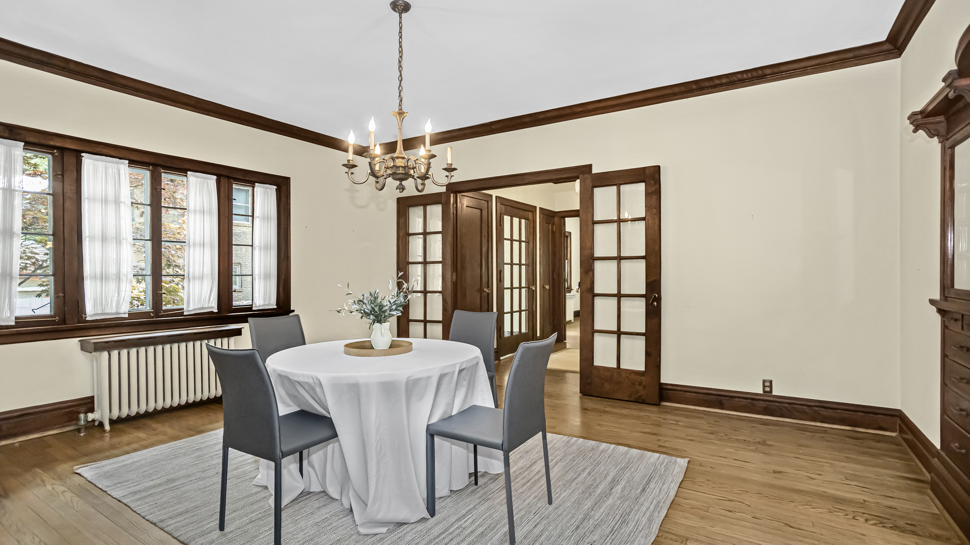 719 Milburn Street Evanston, IL 60201 - Photo 11 of 35 a view of a dining room with furniture window and wooden floor