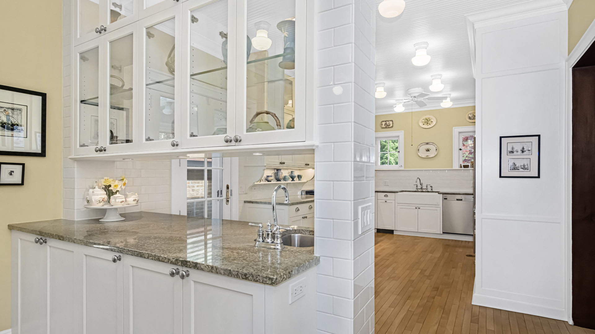 719 Milburn Street Evanston, IL 60201 - Photo 14 of 35 a kitchen with stainless steel appliances granite countertop a refrigerator and a sink