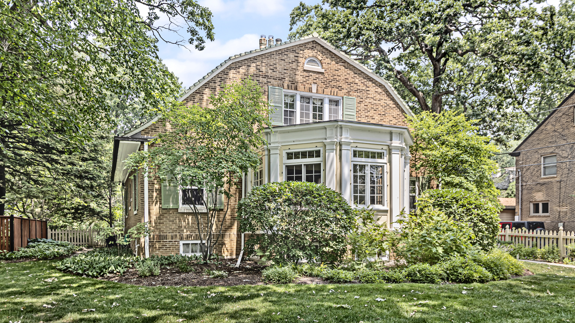 719 Milburn Street Evanston, IL 60201 - Photo 2 of 35 front view of a house with a tree