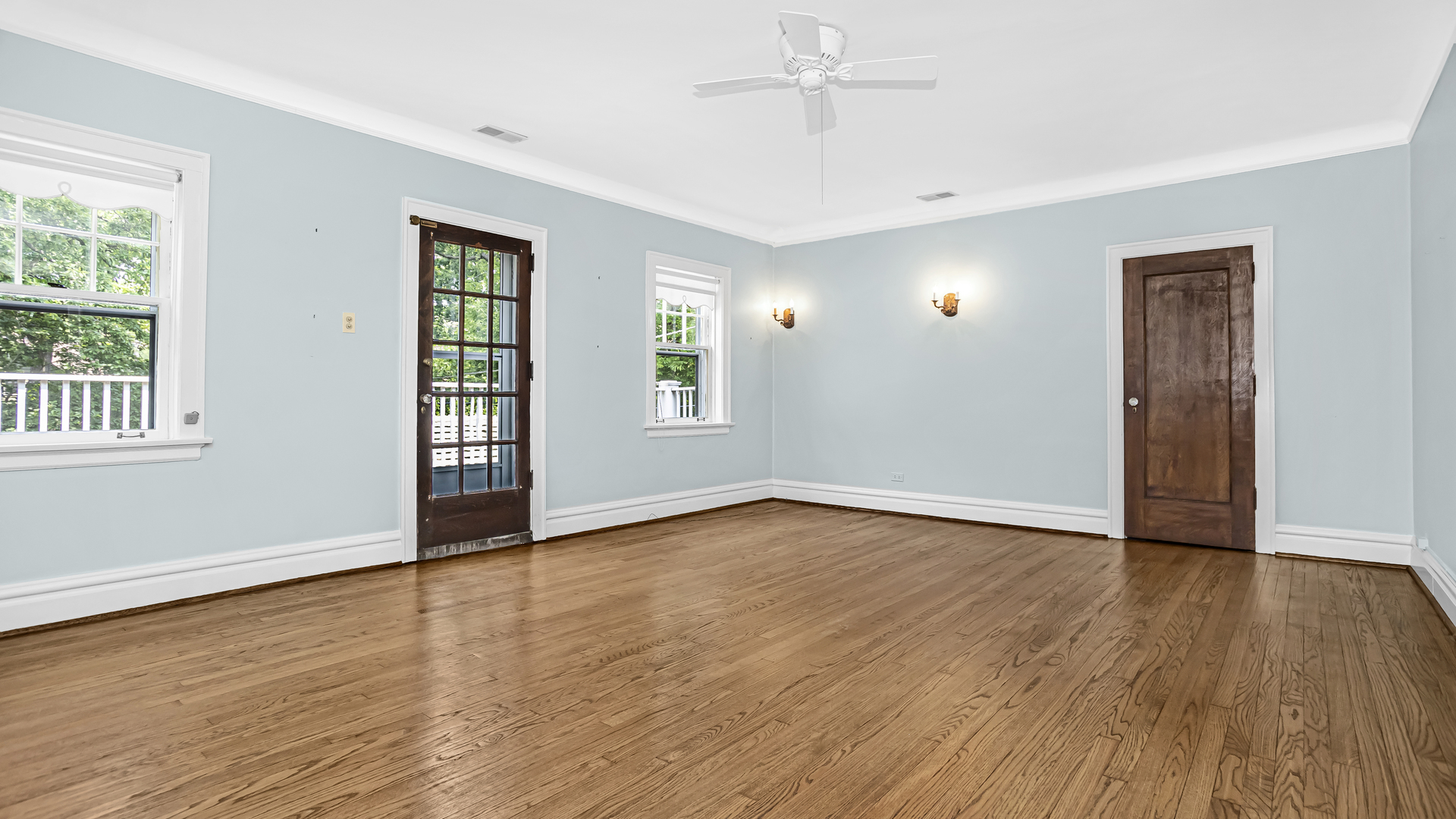 719 Milburn Street Evanston, IL 60201 - Photo 24 of 35 a view of an empty room with wooden floor and a window