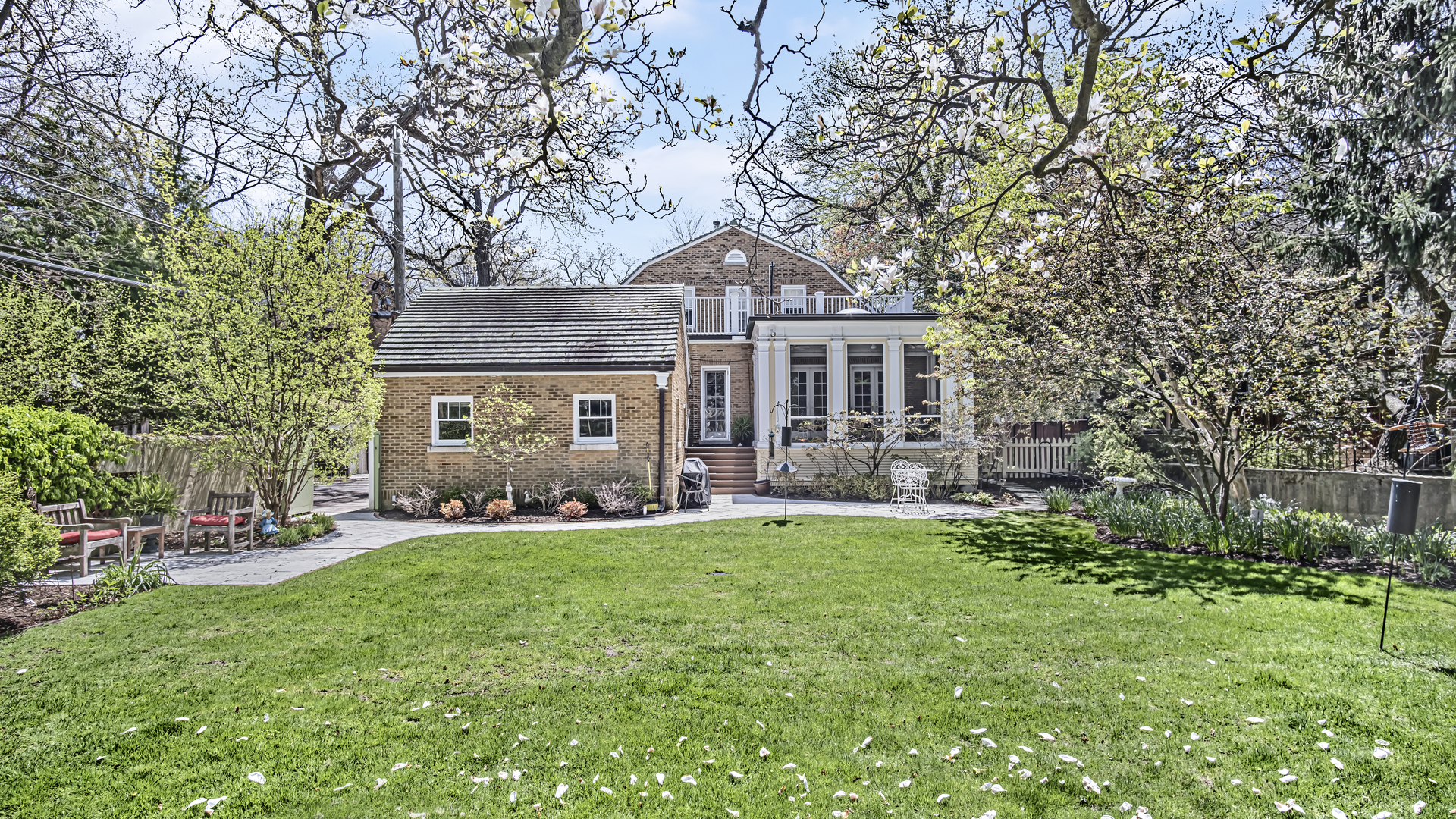 719 Milburn Street Evanston, IL 60201 - Photo 30 of 35 front view of a house with a yard