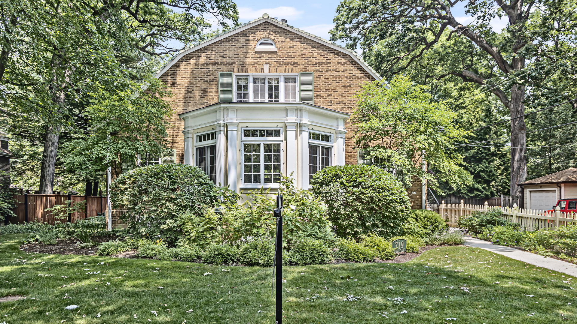 719 Milburn Street Evanston, IL 60201 - Photo 3 of 35 front view of a house with a yard