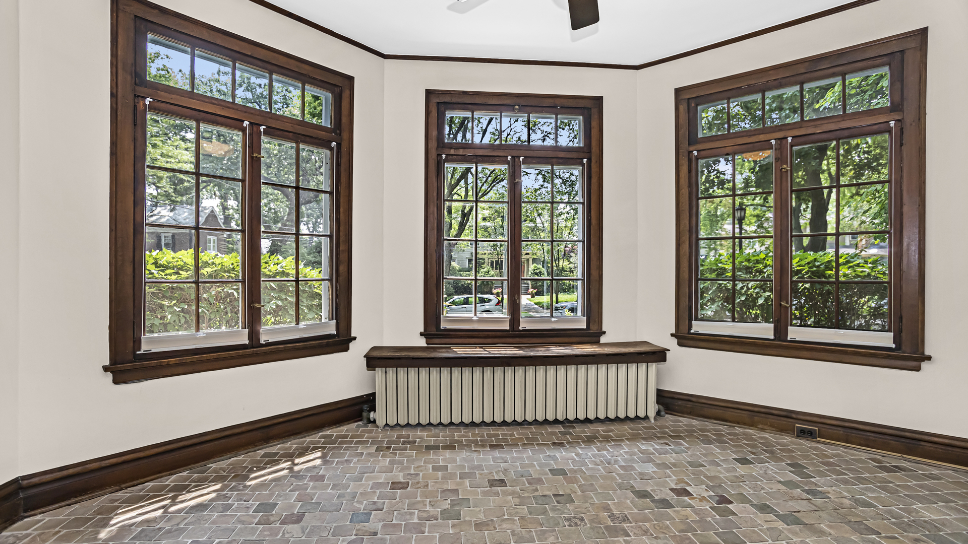 719 Milburn Street Evanston, IL 60201 - Photo 8 of 35 a view of an empty room with a window