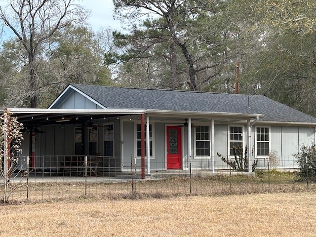 24331 Farm To Market Road 2090 Splendora, TX 77372 - Photo 1 of 38 a view of a house with a yard and large tree