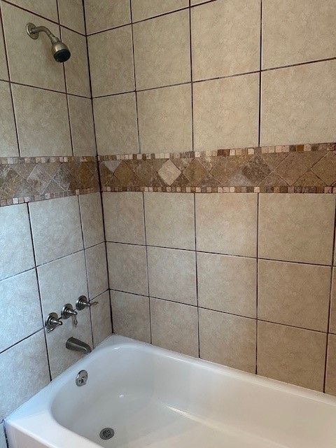 24331 Farm To Market Road 2090 Splendora, TX 77372 - Photo 14 of 38 a bathroom with a tub