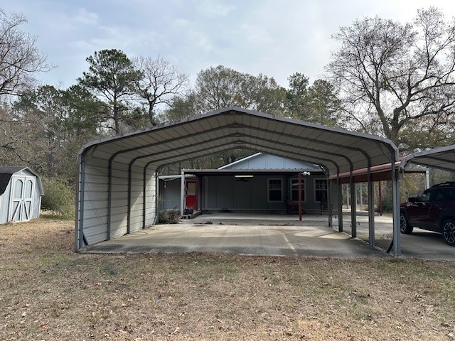 24331 Farm To Market Road 2090 Splendora, TX 77372 - Photo 29 of 38 a house with trees in front of it