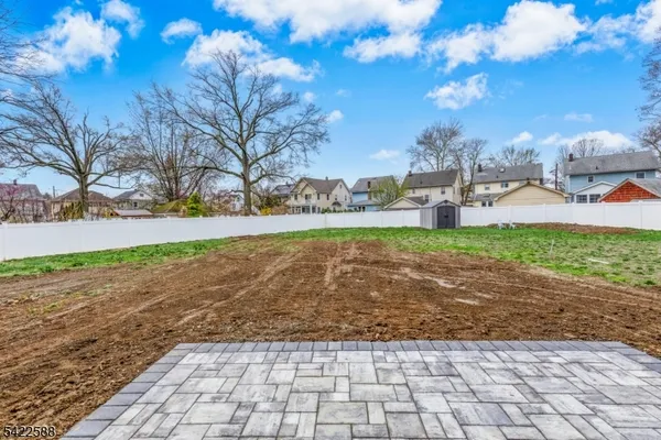 a view of a yard with patio