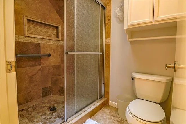 a front view of a house with garage