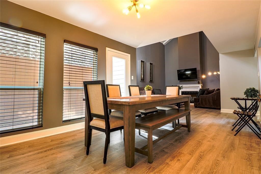 4724 Post Oak Timber Drive, Unit 8/65 Houston, TX 77056 - Photo 10 of 21 a view of a dining room with furniture and wooden floor