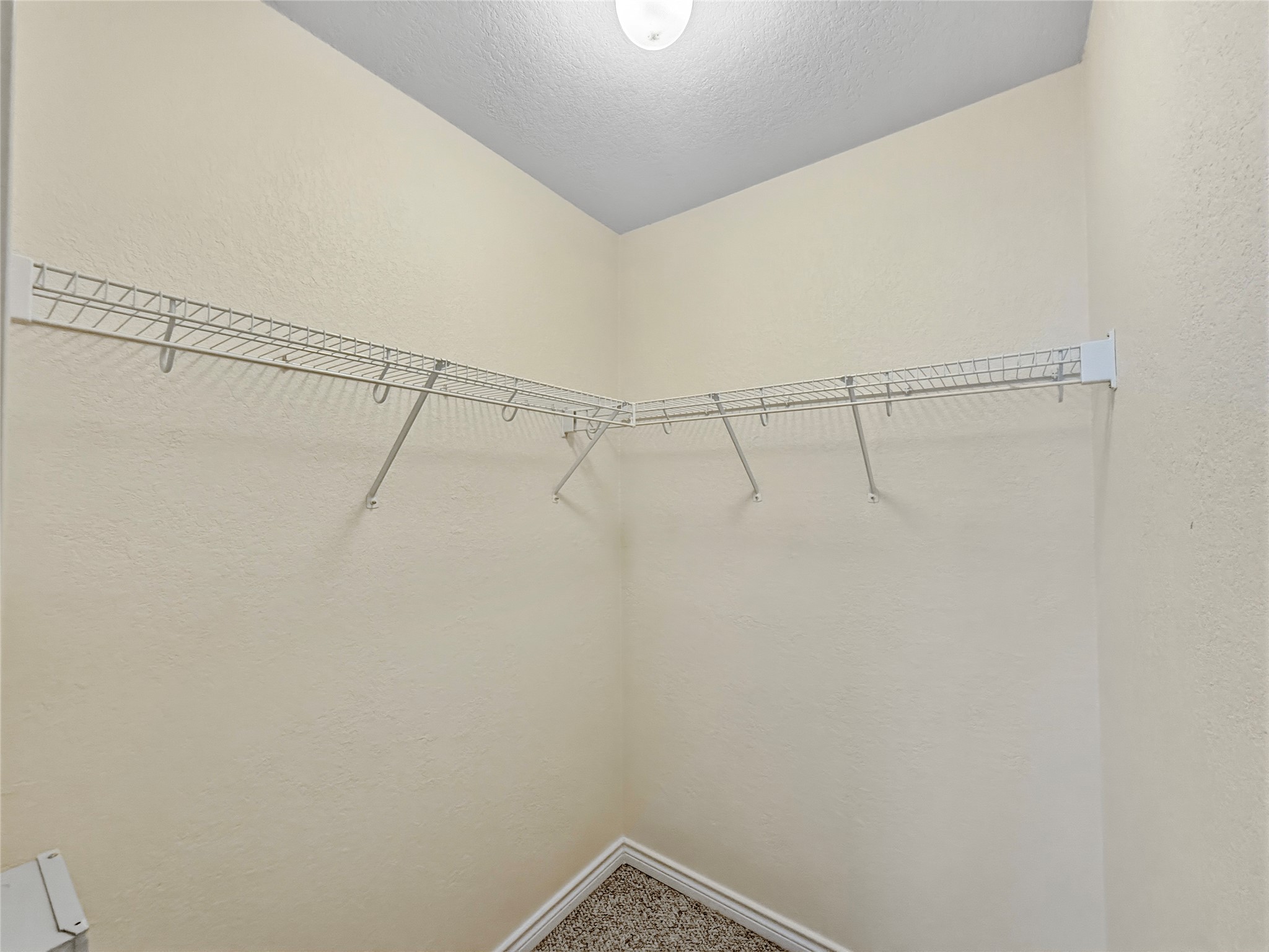 9215 Rowlands Sayle Road Austin, TX 78744 - Photo 11 of 14 Primary Bedroom Closet