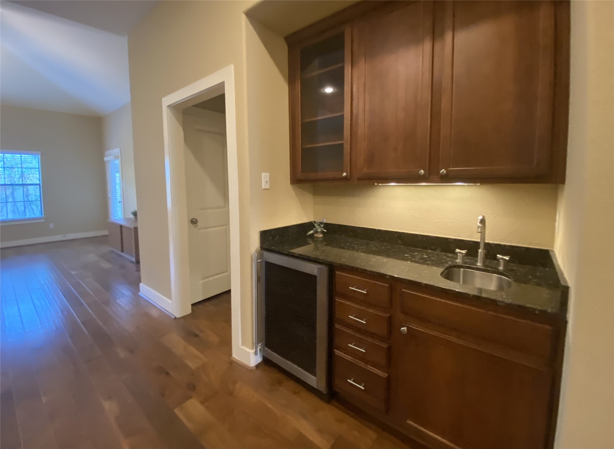 6057 Yale Street Houston, TX 77076 - Photo 14 of 49 a kitchen with a sink and cabinets