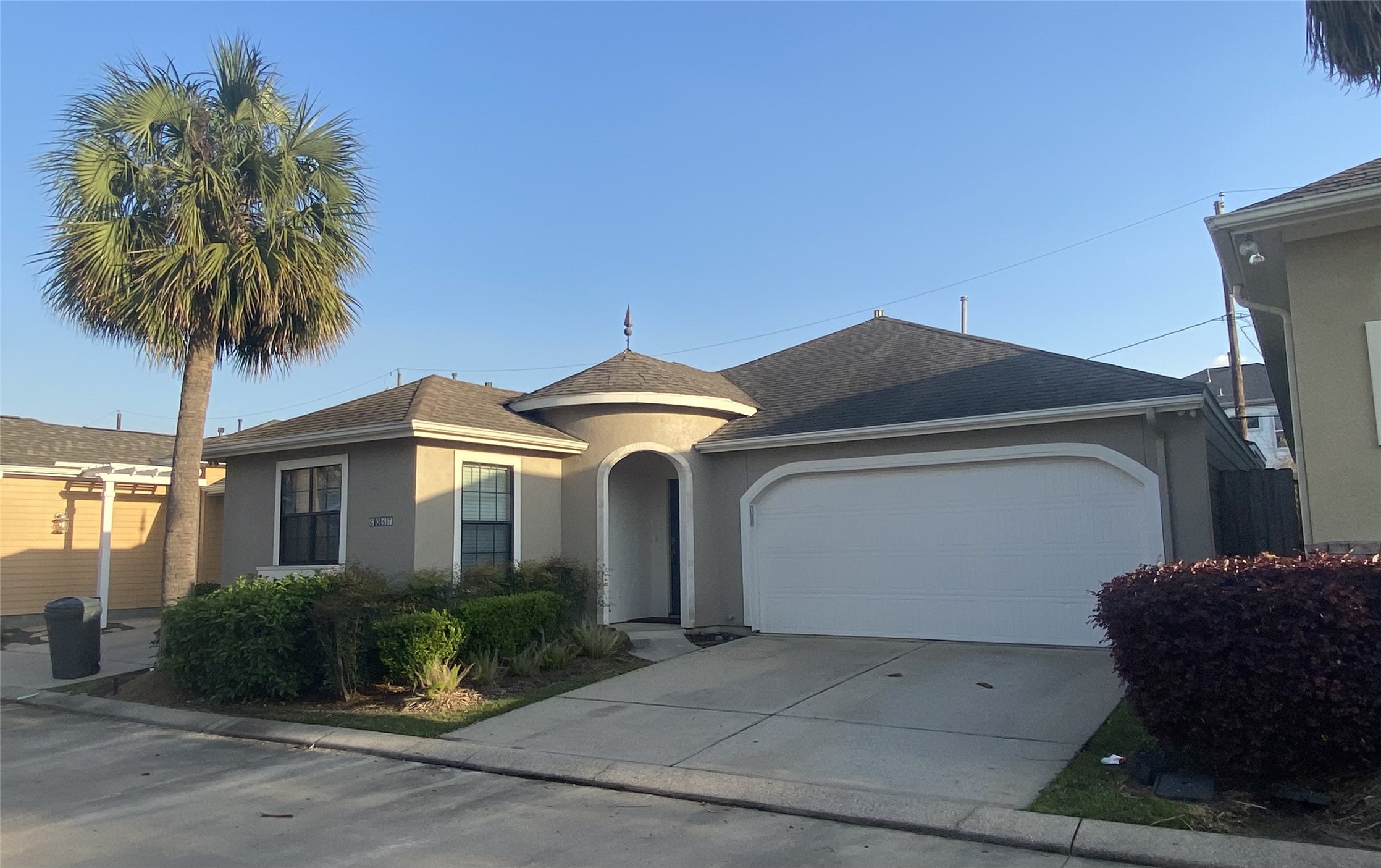 6057 Yale Street Houston, TX 77076 - Photo 2 of 49 a front view of a house with garden