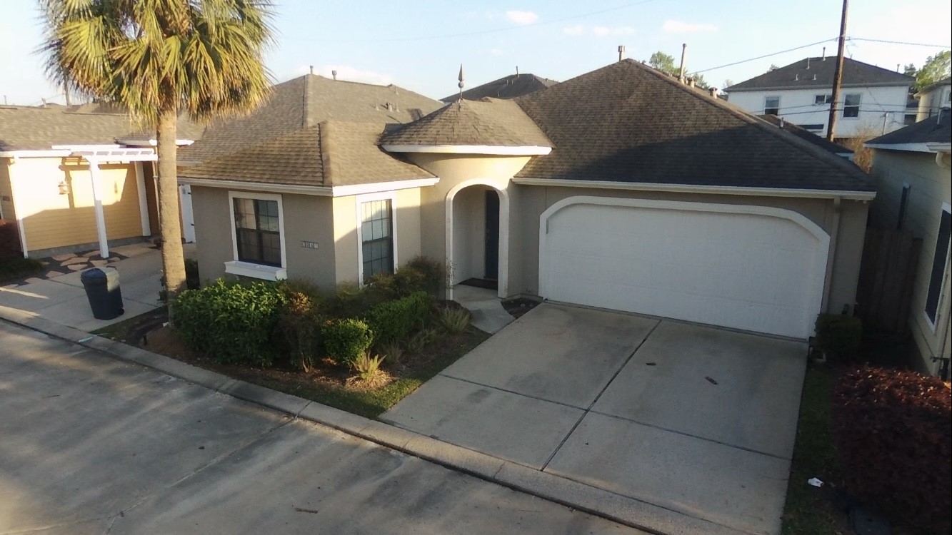 6057 Yale Street Houston, TX 77076 - Photo 6 of 49 a front view of a house with garden