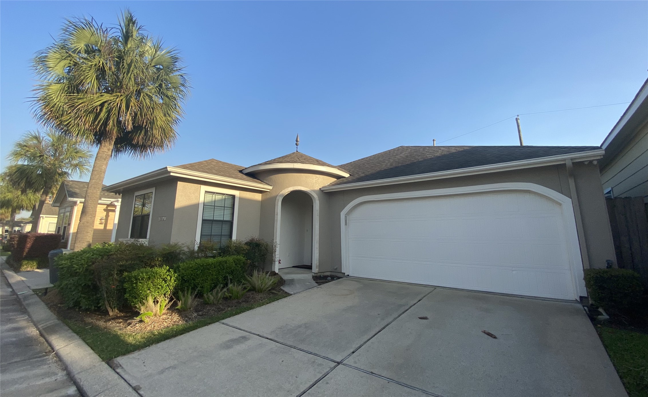 6057 Yale Street Houston, TX 77076 - Photo 7 of 49 a front view of a house with garden