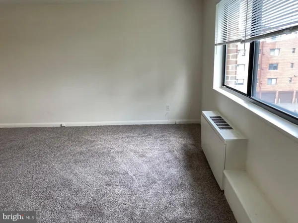 a view of a kitchen with a sink and dishwasher
