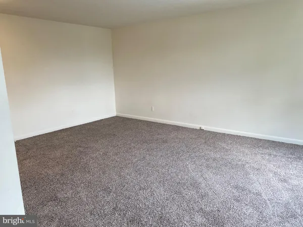 an entryway of a house with windows