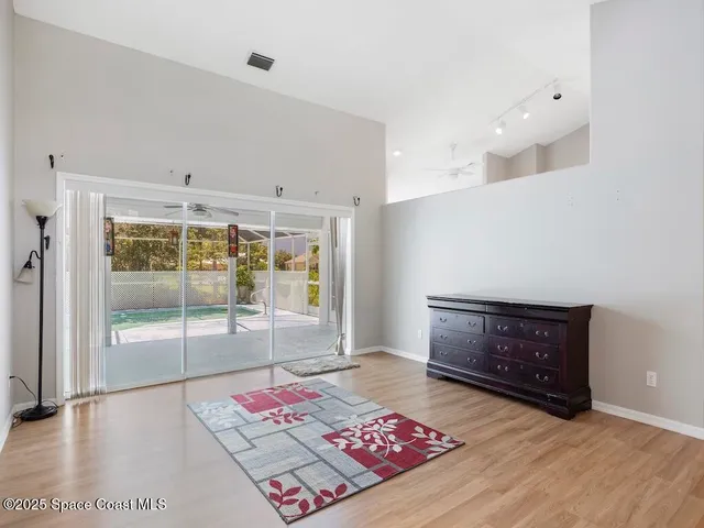 a living room with a rug