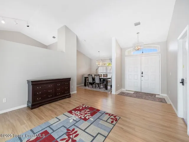 a kitchen with cabinets and window
