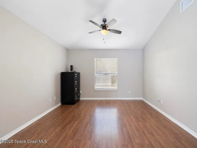 a kitchen with a sink cabinets and window