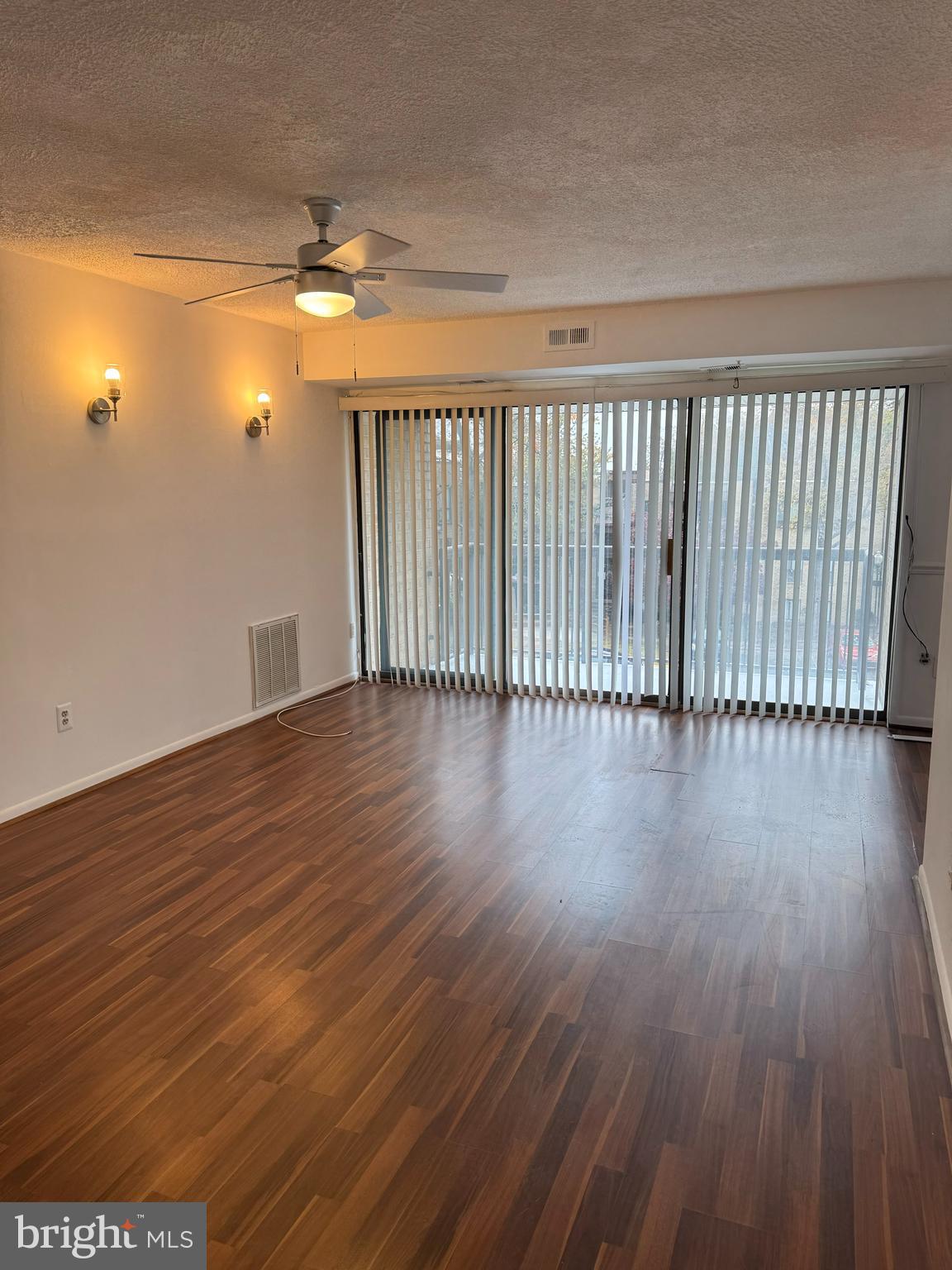 7597 Gales Court, Unit 7A 202 Manassas, VA 20109 - Photo 1 of 16 a view of a room with wooden floor