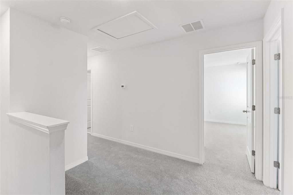 721 Spartina Street Lady Lake, FL 32159 - Photo 15 of 32 a view of an empty room