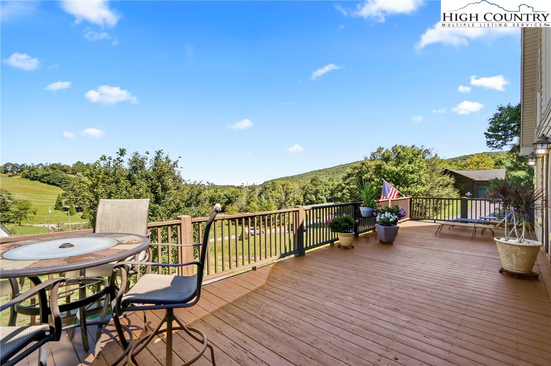 195 Omerta Lane Boone, NC 28607 - Photo 26 of 50 a view of a chairs and table in the patio
