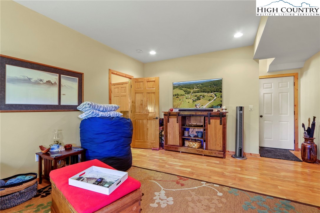 195 Omerta Lane Boone, NC 28607 - Photo 37 of 50 a bedroom with furniture and window