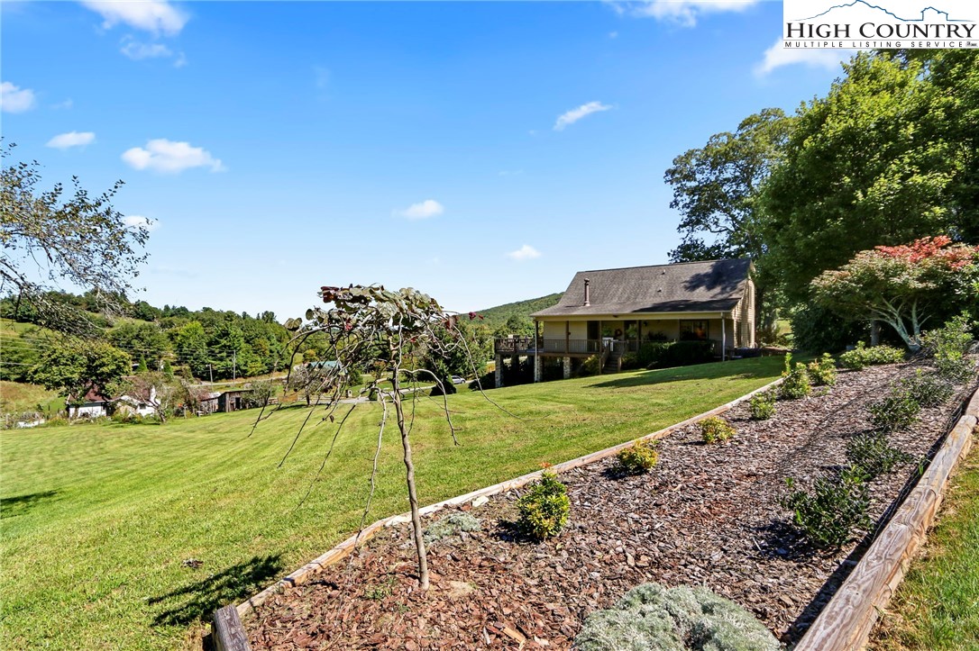 195 Omerta Lane Boone, NC 28607 - Photo 45 of 50 a view of a golf course with a park