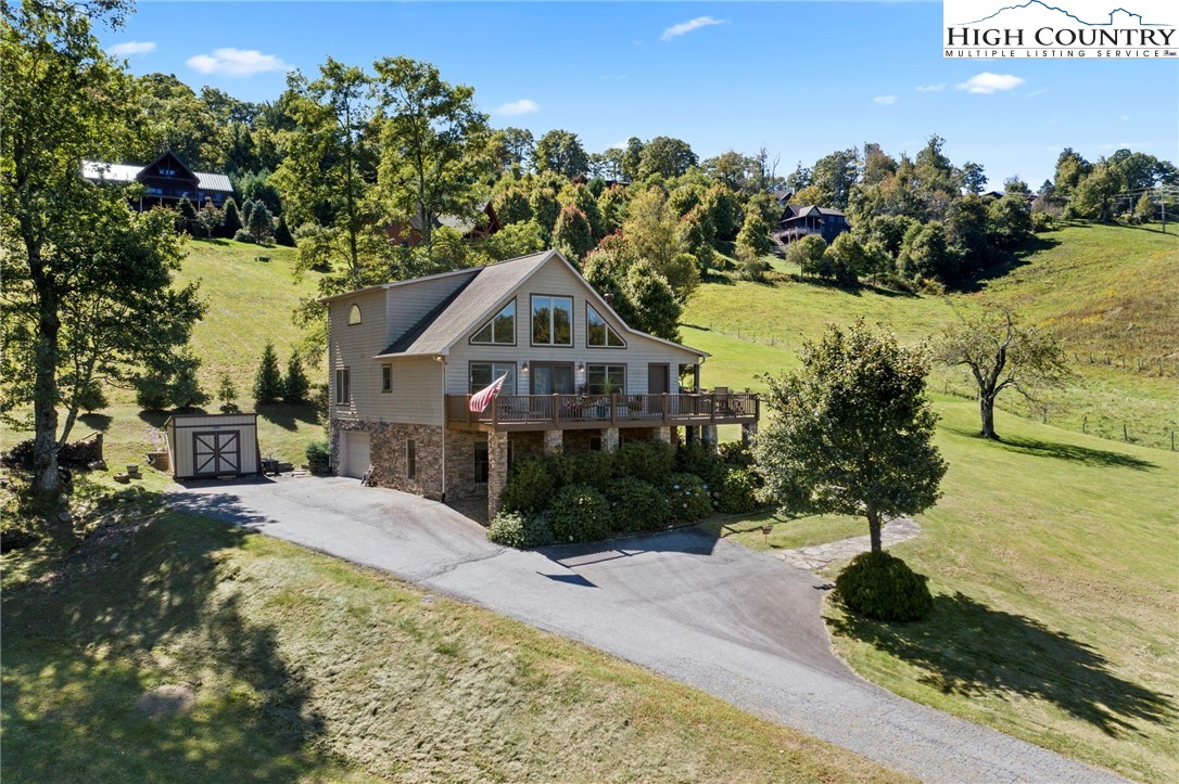 195 Omerta Lane Boone, NC 28607 - Photo 48 of 50 a front view of a house with a yard