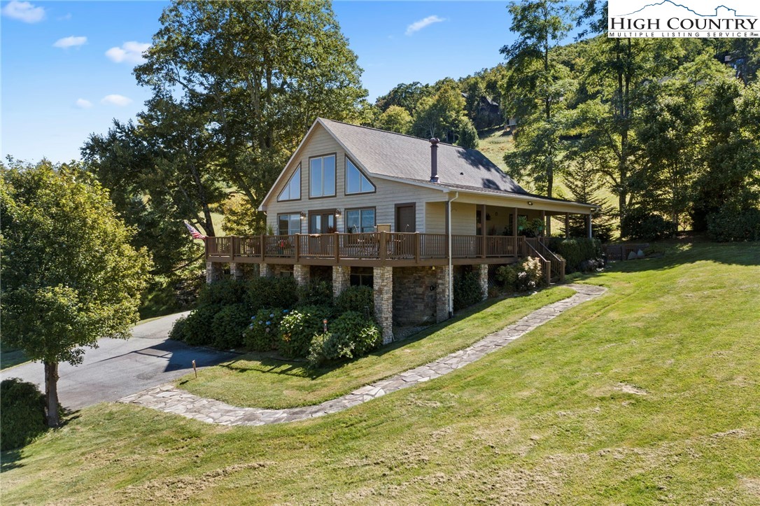 195 Omerta Lane Boone, NC 28607 - Photo 49 of 50 a view of a house with a yard