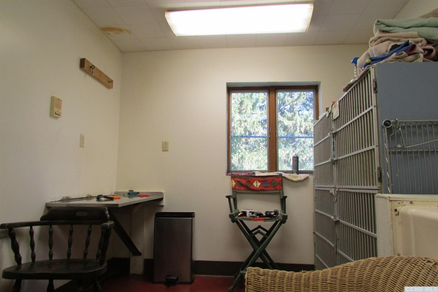 120-126 Lower Post Road Ghent, NY 12075 - Photo 11 of 21 a view of a workspace with furniture and a window