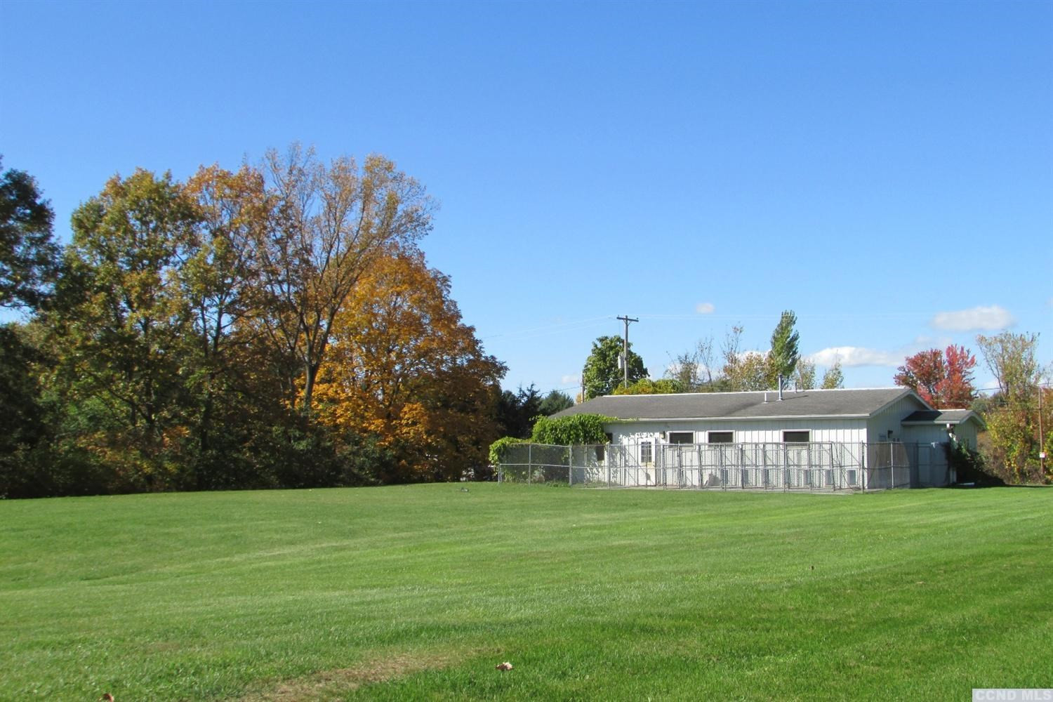 120-126 Lower Post Road Ghent, NY 12075 - Photo 14 of 21 a view of a big house with a big yard
