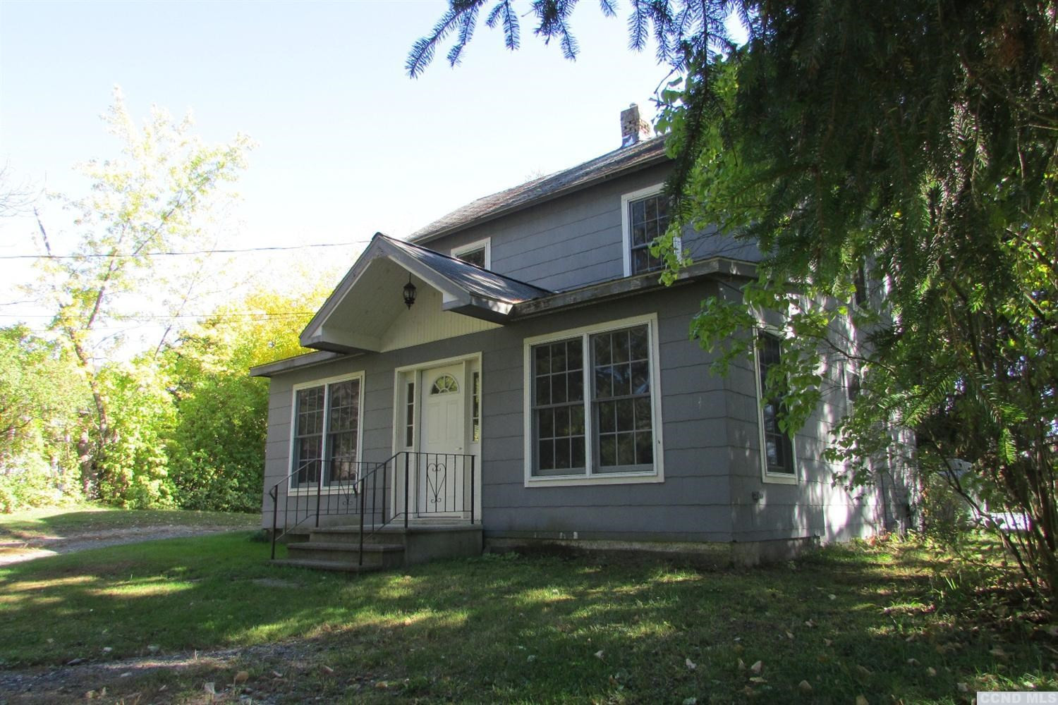 120-126 Lower Post Road Ghent, NY 12075 - Photo 3 of 21 front view of a house with a yard