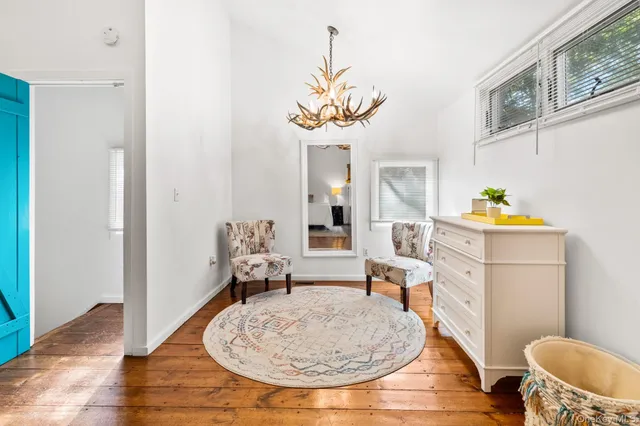 a living room with furniture and a table