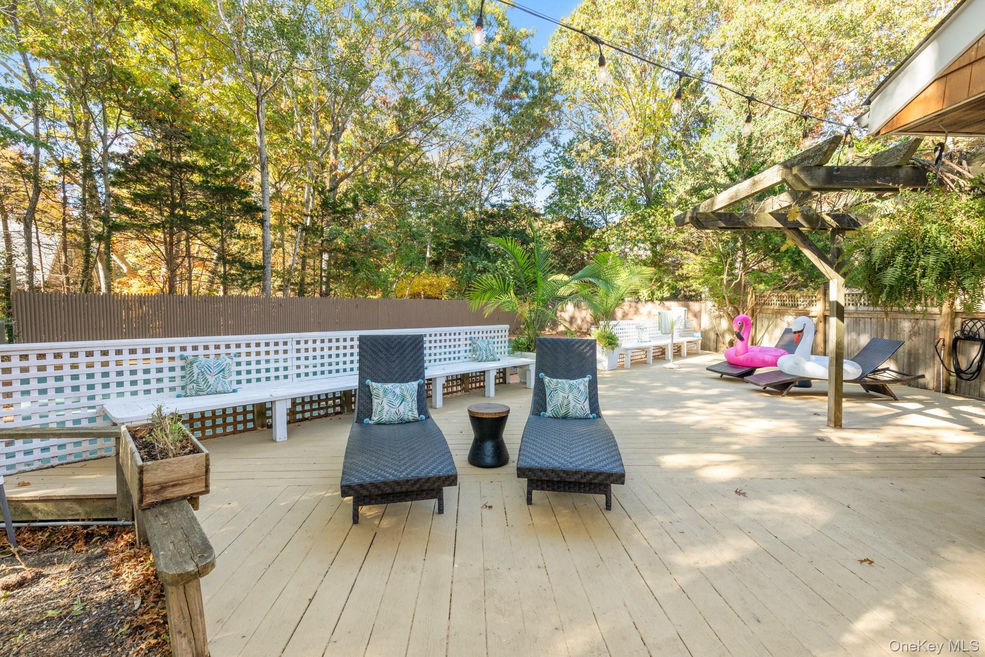 20 Norfolk Drive Springs, NY 11937 - Photo 18 of 23 swimming pool view with a seating space