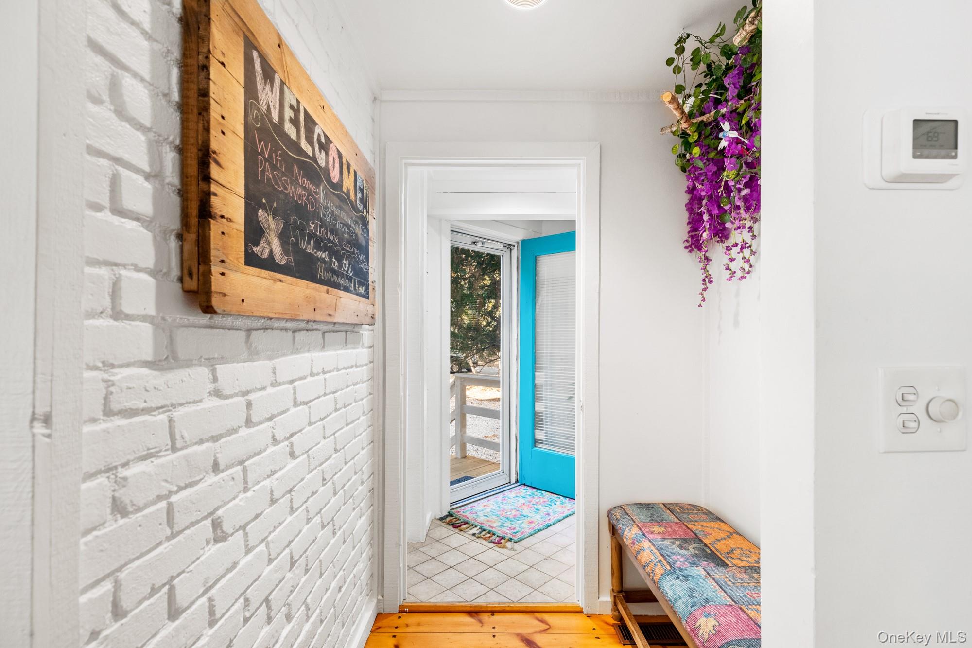 20 Norfolk Drive Springs, NY 11937 - Photo 3 of 23 a view of entryway with a rug