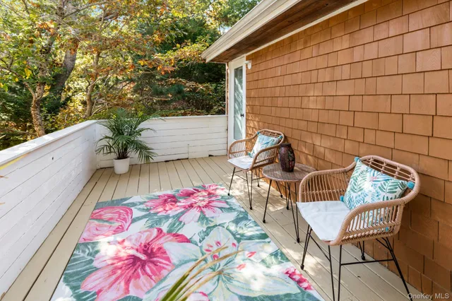a backyard of a house with seating space