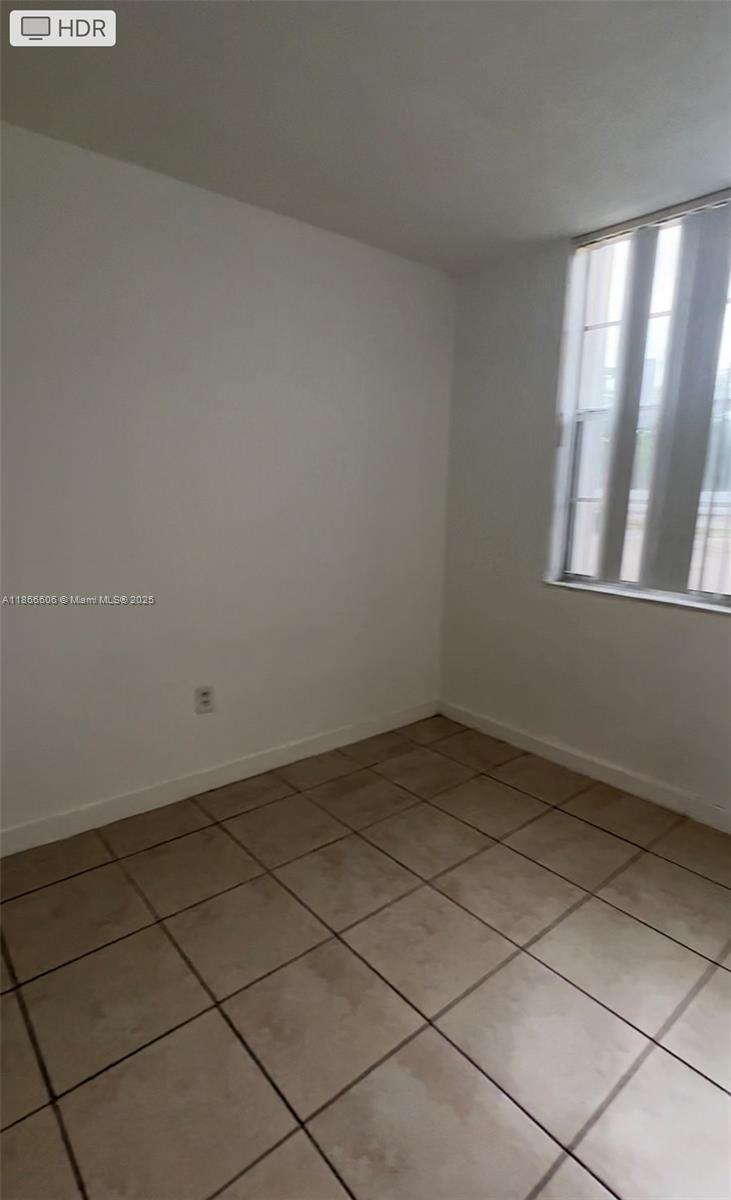 498 Northwest 165th Street, Unit D101 Miami, FL 33169 - Photo 4 of 8