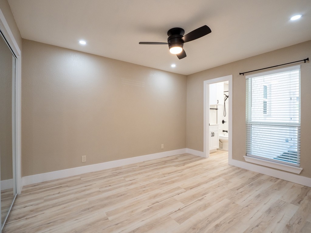 8314 Bowling Green Drive, Unit B Austin, TX 78757 - Photo 18 of 22 Spare room featuring light wood-type flooring, ceiling fan, and recessed lighting