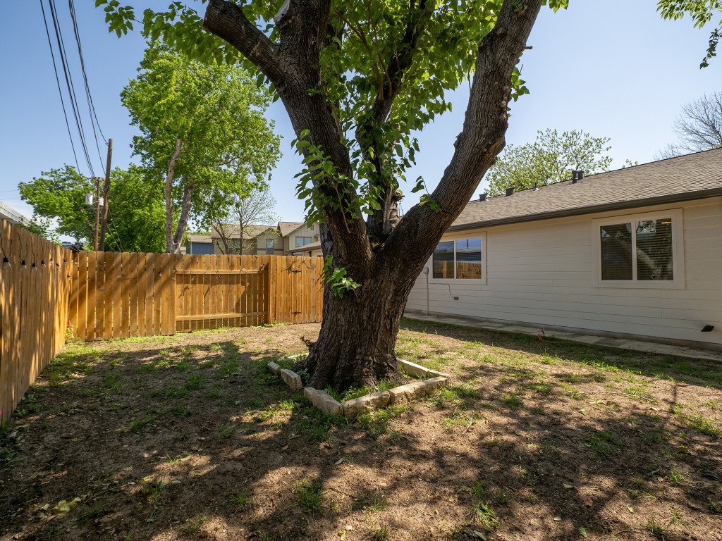 8314 Bowling Green Drive, Unit B Austin, TX 78757 - Photo 9 of 22 View of fenced backyard