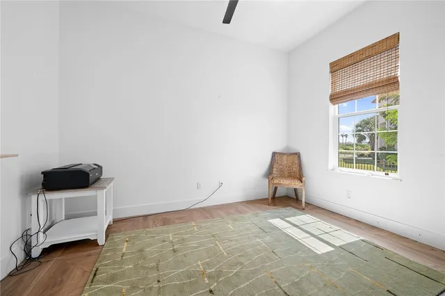 a bathroom with a shower a sink and toilet