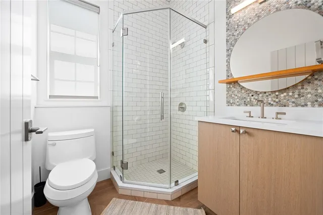 a utility room with sink dryer and washer