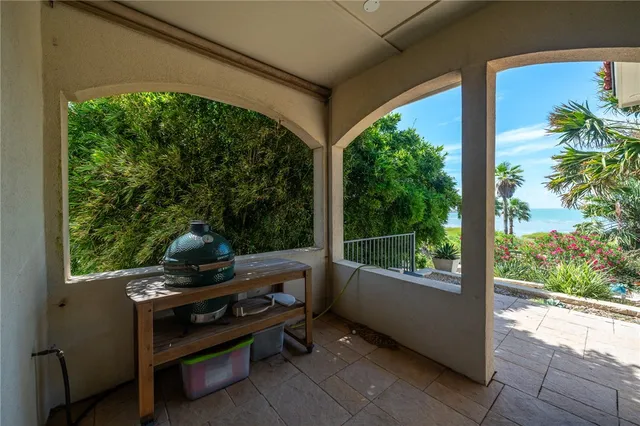 a view of a garden with a patio