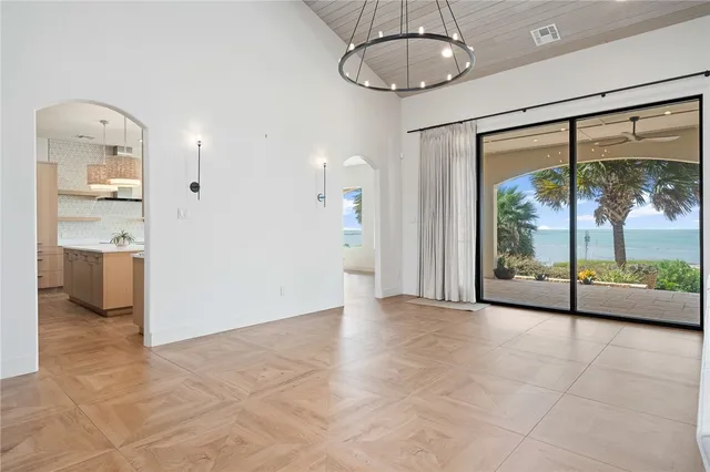 a kitchen with a sink stove and refrigerator